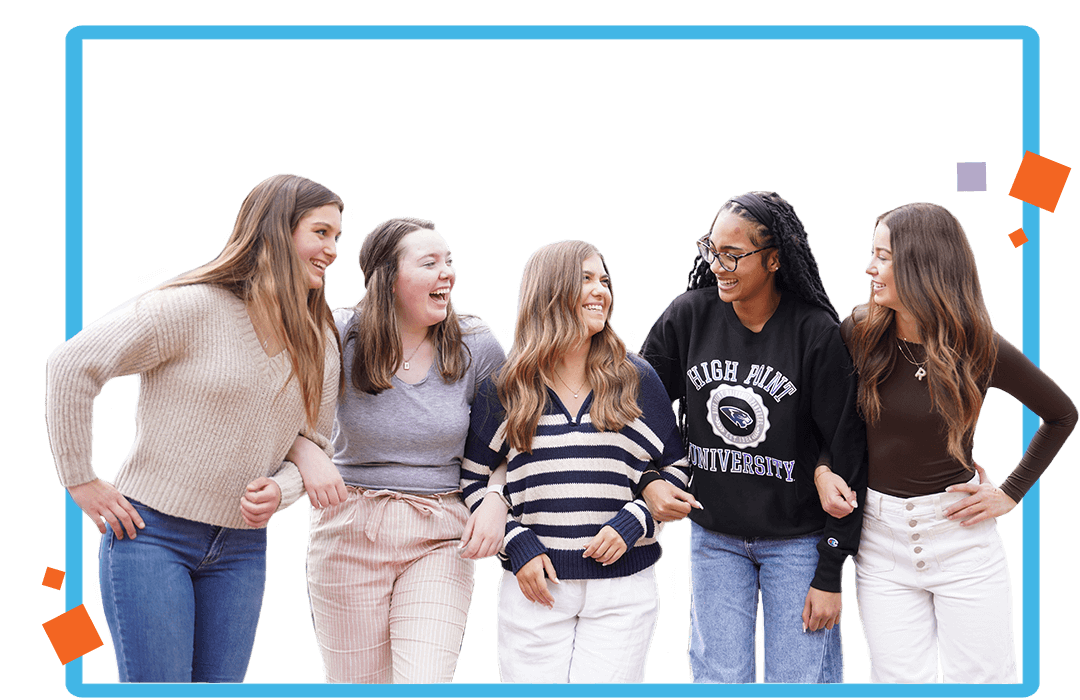 Five students with linked arms laughing