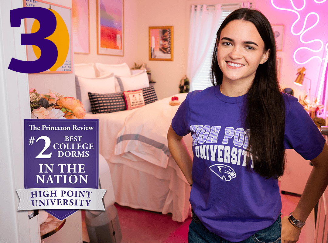 A student in her dorm room with the #2 Best college dorms badge from the princeton review